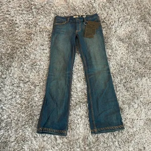 Antik Denim Boot Leg Embroidered Jeans