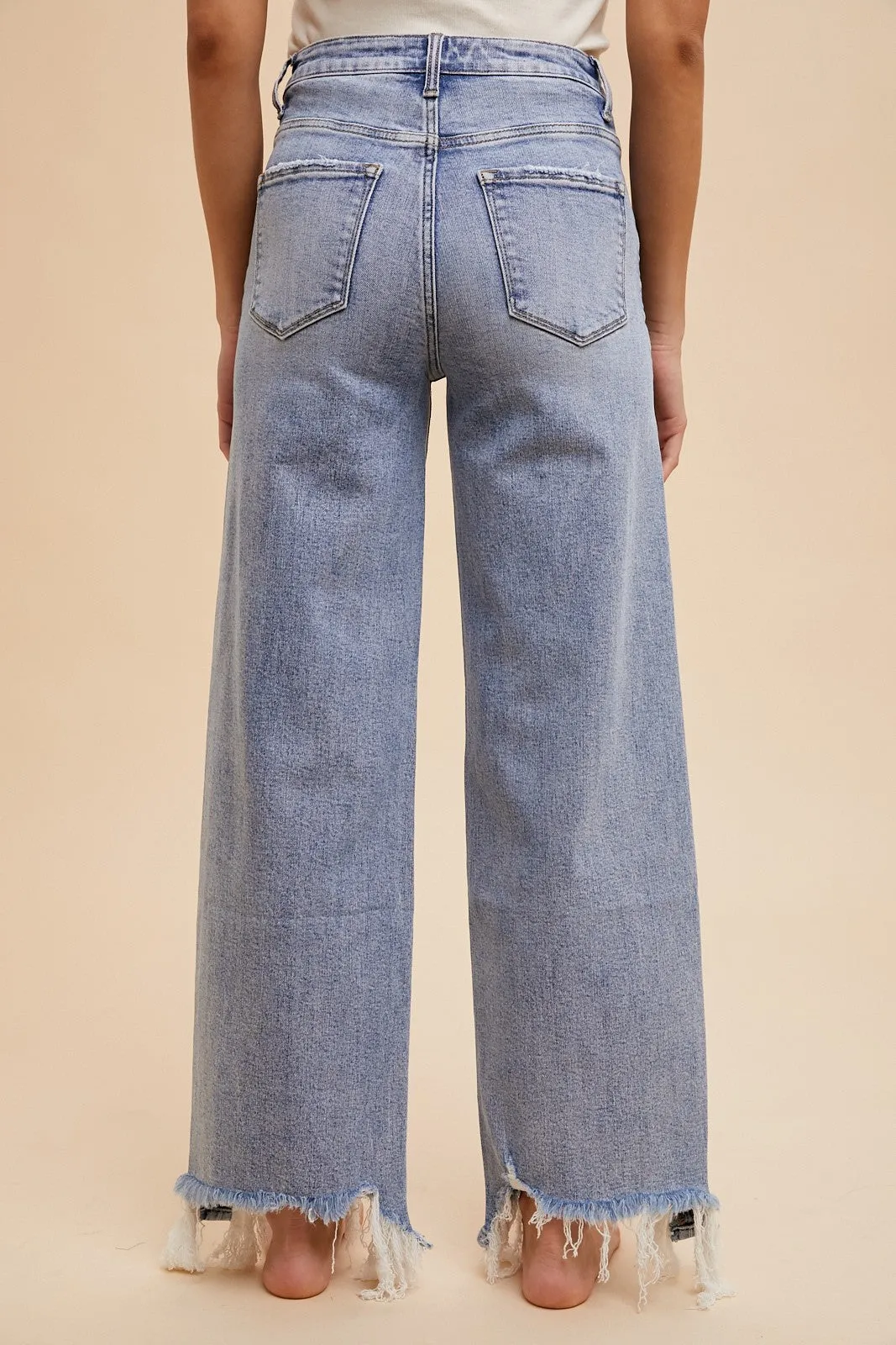 ASYMMETRICAL DISTRESSED HEM STRAIGHT FIT