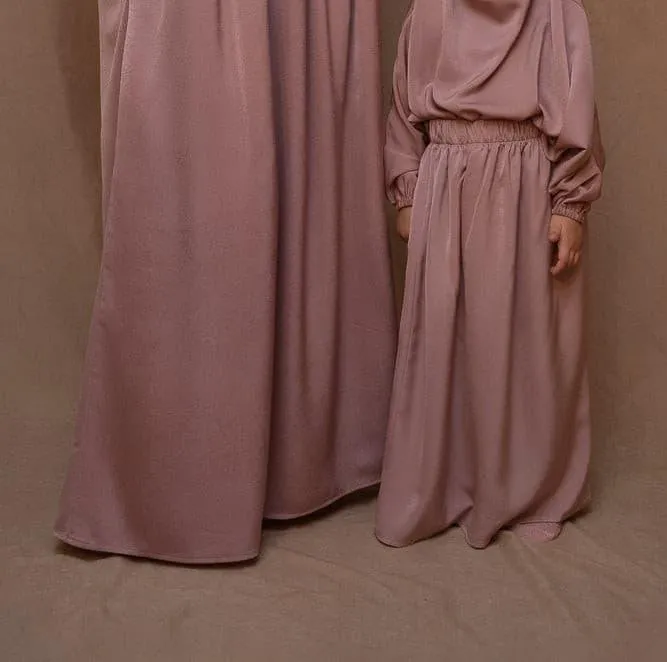 Coraal KIDS prayer gown from "Mommy and me prayer khimar collection" in light pink