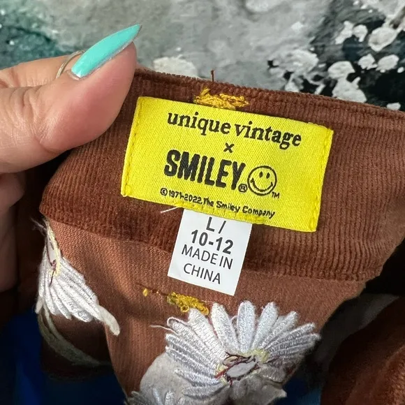 Unique Vintage x Smiley Happy Daisy High Rise Flare Jeans